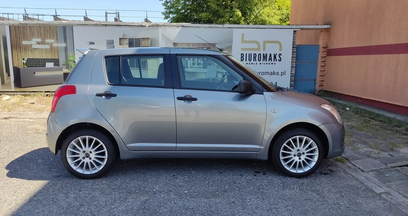 Suzuki Swift cena 14900 przebieg: 150000, rok produkcji 2009 z Lidzbark małe 277